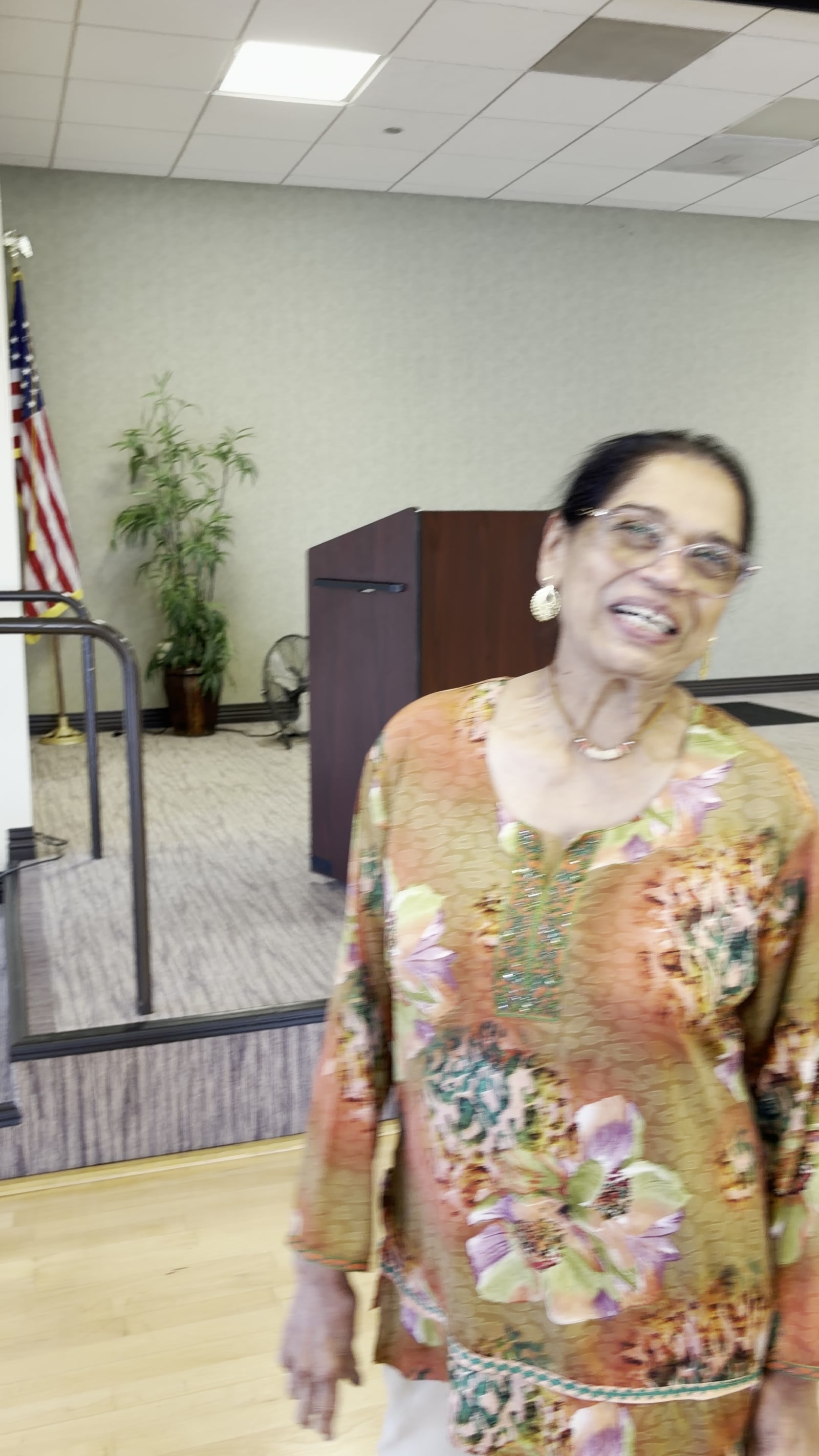 A workshop participant smiling