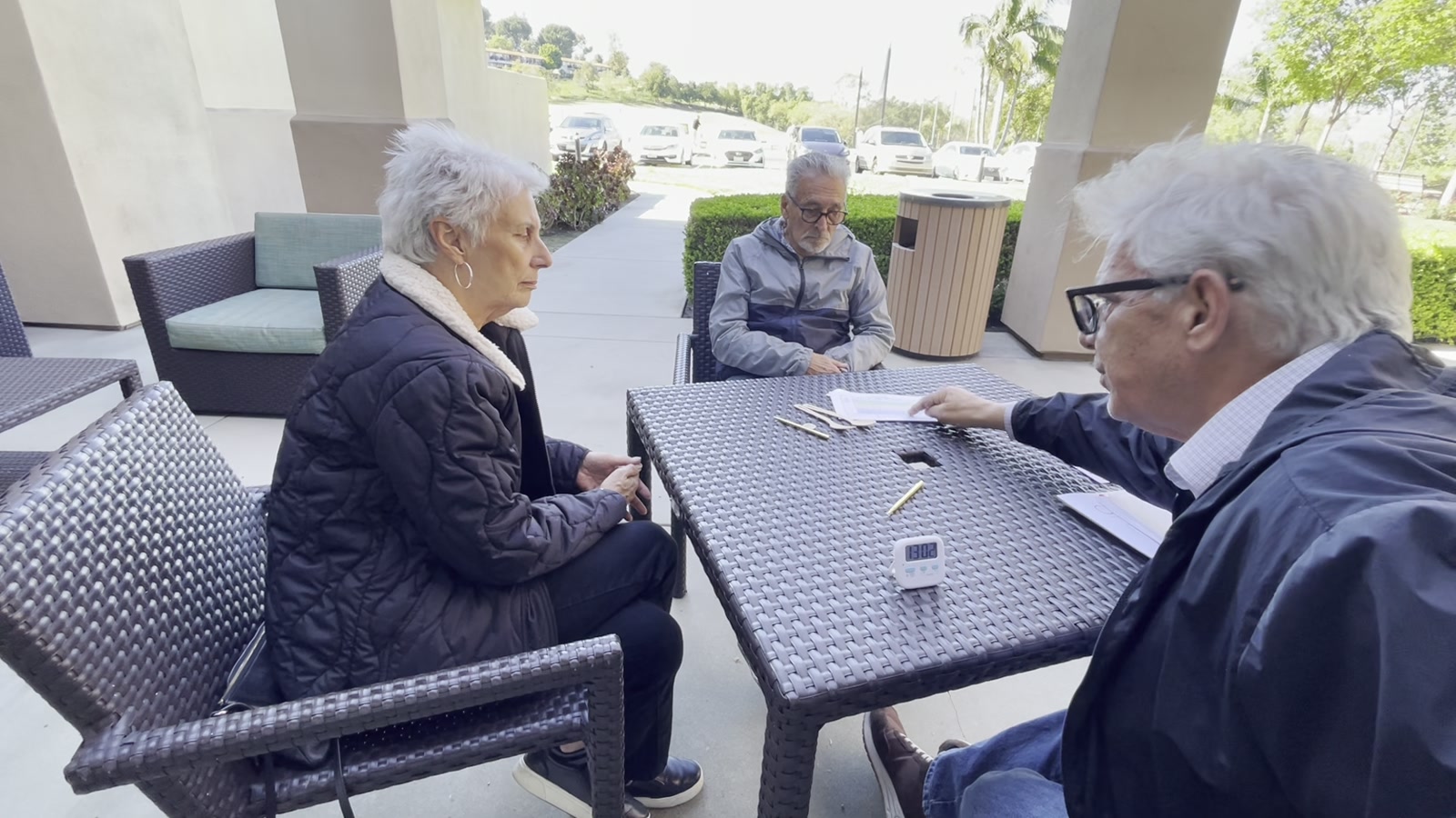 One participant giving the cognitive assessment to another